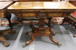 A 19th century mahogany D-shaped fold over card table.
