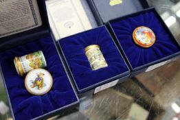 Four Halcyon Days enamel pillboxes, three with original boxes.