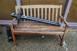 A hardwood garden bench.