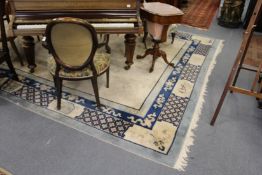 A large Chinese carpet.