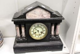 A Victorian slate mantle clock.
