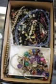 A good collection of costume jewellery to include necklaces etc.