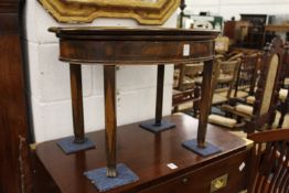 A mahogany oval tray top occasional table.