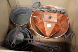 Old copper saucepans and other items.