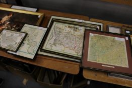A quantity of framed reproduction maps.