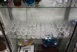 A good collection of cut glass drinking glasses.