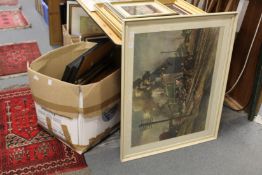 A quantity of paintings and prints.