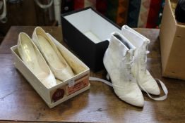 A pair of ladies' evening boots and a pair of shoes.