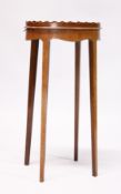 A GEORGIAN STYLE SATINWOOD AND MAHOGANY OVAL URN STAND on tapering legs. 1ft 2ins wide, 2ft 4ins