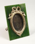 A GOOD RUSSIAN GREEN JADE UPRIGHT PHOTOGRAPH FRAME with silver mounts. 5.75ins high, 3.75ins wide