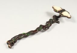 A BRONZE AND STONE SEPTRE 10.5 ins long