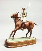 A ROYAL WORCESTER PORCELAIN GROUP, H.R.H. THE DUKE OF EDINBURGH, modelled by Doris Lindker, circa.
