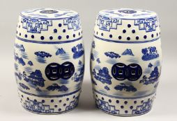 A PAIR OF CHINESE BLUE AND WHITE BARRELL SEATS 18ins high