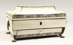 A GOOD 19TH CENTURY ANGLO INDIAN IVORY CASKET with fitted interior, mirrors, drawer to the front
