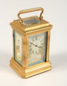 A SMALL LIGHT BLUE SEVRES DESIGN CARRIAGE CLOCK 3ins high