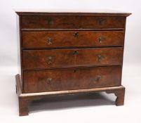 AN 18TH CENTURY WALNUT STRAIGHT FRONT CHEST with cross banded and oval inlaid legs, 2 short and 3