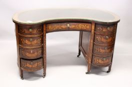 A 19TH CENTURY DUTCH MARQUETRY KIDNEY SHAPED DESK, with leather top, central drawer, four small