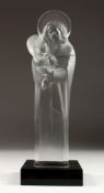 A LARGE LALIQUE CRYSTAL MADONNA AND CHILD, CIRCA 1950 on a black base. Signed, 13.5 ins high.