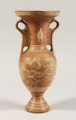 A GRAND TOUR GREEK TWO HANDLED TERRA COTTA VASE 13ins high.