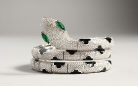 A SILVER ZIRCON AND ENAMEL SNAKE BRACELET.