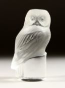 A SMALL FROSTED GLASS LALIQUE OWL. 3.5ins high signed