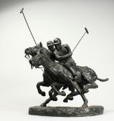 H. HAND A SUPERB BRONZE POLO GROUP, TWO POLO PLAYERS ON HORSEBACK. Signed H. Hand, No. A 40. 18ins
