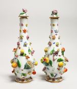 A GOOD PAIR OF MEISSEN FLOWER AND FRUIT ENCRUSTED VASES AND COVERS. Cross swords mark in blue. 10.
