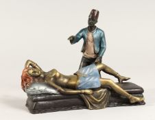 A PAINTED BRONZE OF A MAN, lifting up a sleeping woman's skirt. 7 ins long