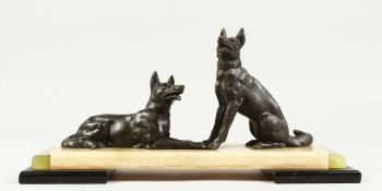 AN ART DECO ONYX AND BRONZE GROUP OF TWO ALSATIONS. 13ins long.