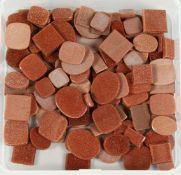 A BOX OF GOLDSTONE LOOSE STONES