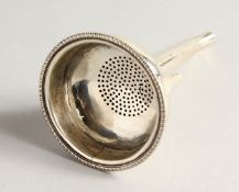 A GEORGE III SILVER WINE FUNNEL by Hester Bateman, London, 1774.