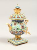 A SMALL RUSSIAN SILVER AND ENAMEL SAMOVA