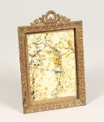AN EMPIRE BRASS PHOTOGRAPH FRAME 6.5ins x 4.5ins