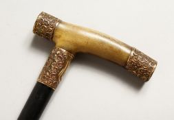A RHINO HANDLE WALKING STICK with tablet 'R.E. HODGSON' 33ins long.
