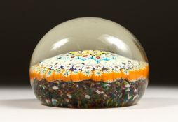 A LARGE MILLIFIORI PAPERWEIGHT. 3.5ins diameter.
