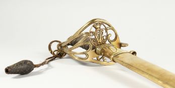 A GOOD VICTORIAN NAVAL SWORD with shagreen handle and engraved blade, V R & Crown inc., brown