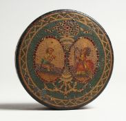 A GEORGIAN PAPIER MACHE CIRCULAR BOX, the top painted with two musicians. 3ins diameter.