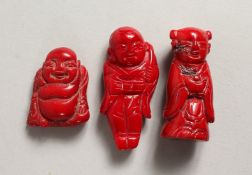 THREE CARVED CORAL FIGURES OF MEN