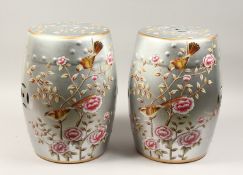 A PAIR OF CHINESE SILVERED ROSE DECORATED SEATS 18ins high.