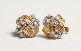 A PAIR OF GOLD DIAMOND SET CUFF LINKS each with 8 diamonds 13.3gms.