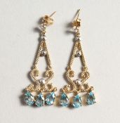 A PAIR OF 9CT GOLD, BLUE TOPAZ AND DIAMOND EARRINGS