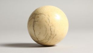 AN IVORY BILLIARD BALL 1.75ins