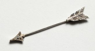 AN ARROW BROOCH PIN.