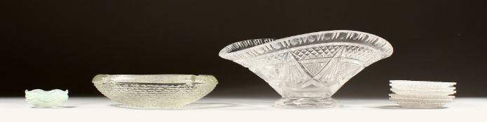 A SWALLOW CUT GLASS FRUIT BOWL, ASHTRAY AND TWO DISHES.