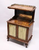 A GOOD VICTORIAN FIGURED WALNUT CUPBOARD with brass gallery, mirrored back over a pair of silk lined