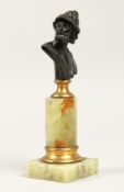 AFTER THE ANTIQUE A bronze bust of a Roman, on an onyx base 6.5ins high.