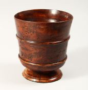 A TURNED WOODEN BOWL