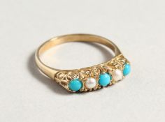 A 9CT GOLD TURQUOISE AND PEARL RING