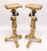 A GOOD PAIR OF EARLY 20TH CENTURY GILDED BLACKAMOOR STANDS with rectangular top, blackamoor supports