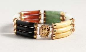 A CHINESE 14CT GOLD MULTI COLOURED JADE BRACELET.
